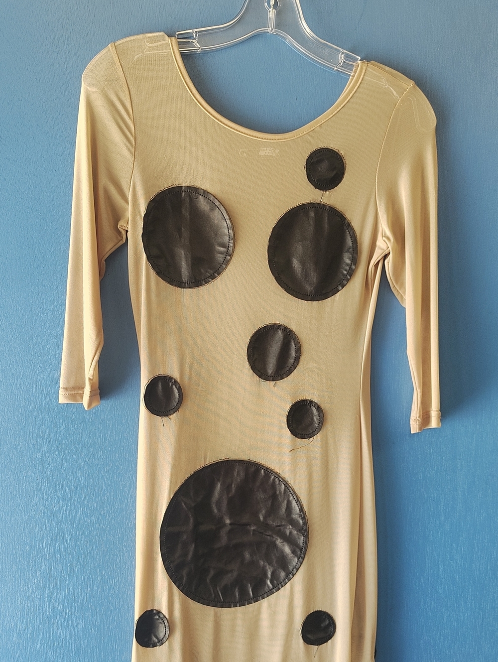 Beige Dress with Black Circular Leather Appliqués
